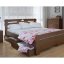 Деревянные кровати: преимущества и особенности материала изготовления